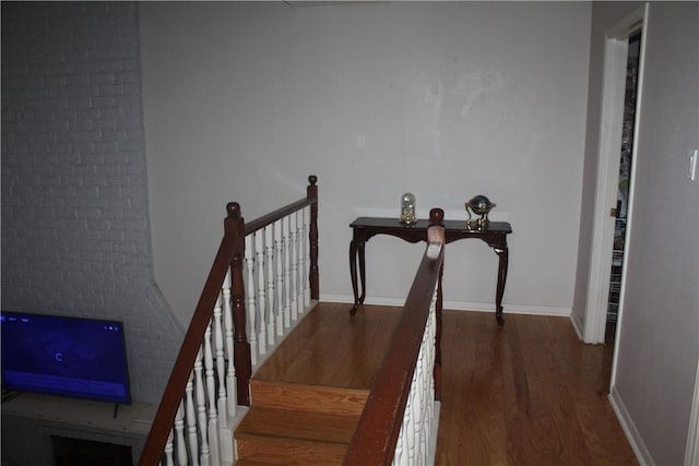 6605 Whitewing Dr, Corpus Christi, TX 78413 - stairs featuring wood finished floors and baseboards