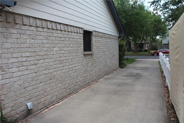 6605 Whitewing Dr, Corpus Christi, TX 78413 - view of property exterior featuring brick siding
