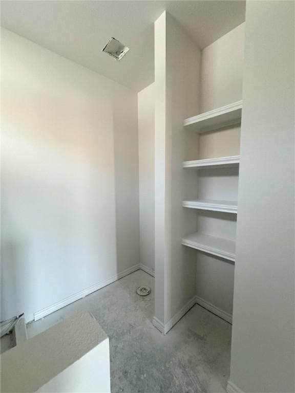 bathroom with concrete floors