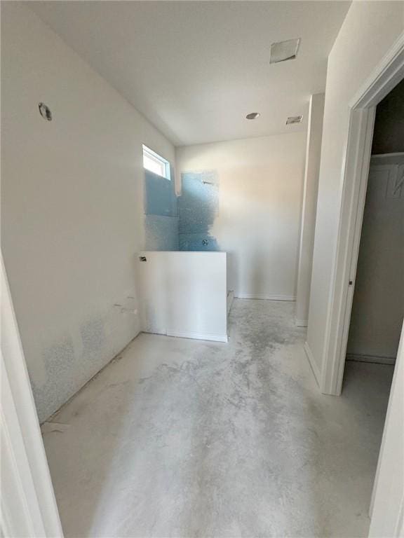 bathroom featuring concrete floors