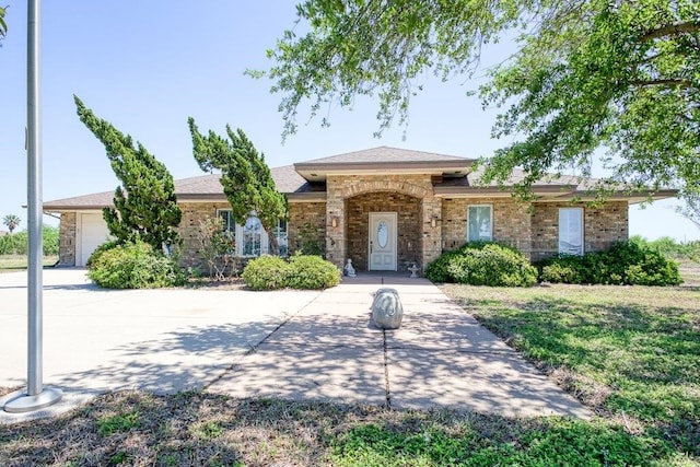 ranch-style house with brick siding
