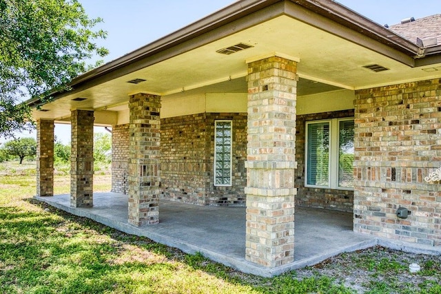 view of patio featuring a porch