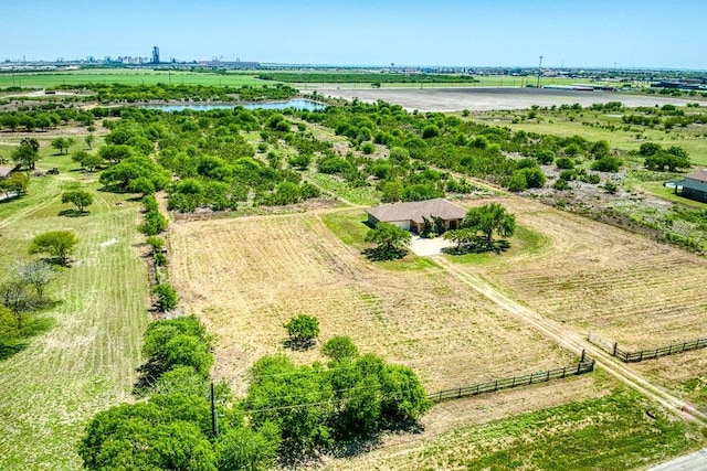 aerial view featuring a rural view and a water view