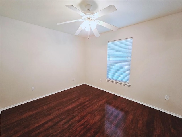 empty room featuring wood-type flooring and ceiling fan