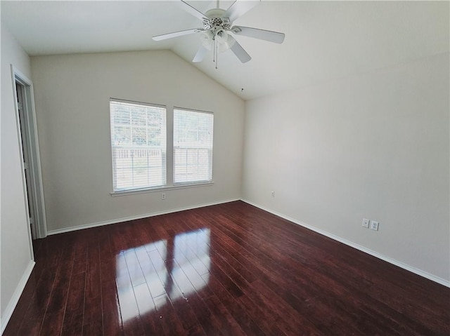 unfurnished room with lofted ceiling, dark hardwood / wood-style floors, and ceiling fan