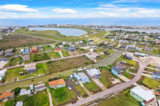 aerial view featuring a water view and a residential view