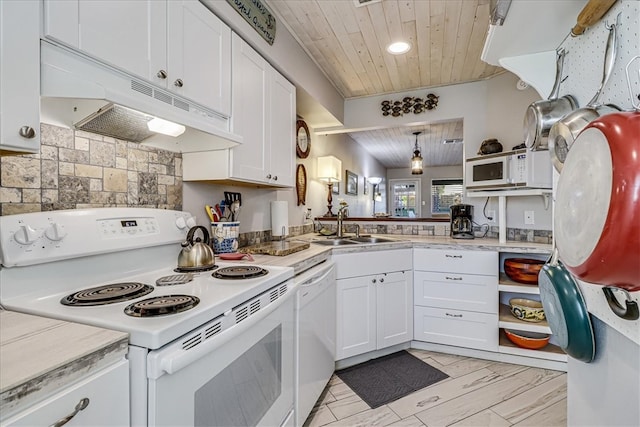 kitchen featuring decorative light fixtures, wood ceiling, sink, white cabinets, and white appliances