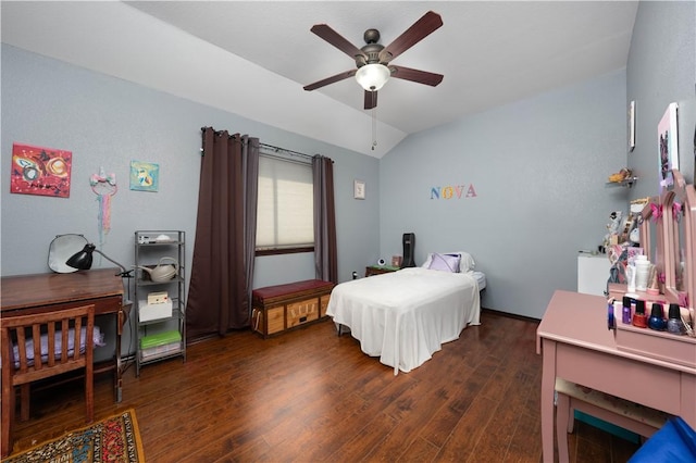 bedroom featuring vaulted ceiling, dark wood-type flooring, and ceiling fan