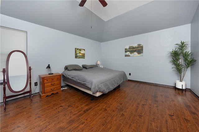 bedroom with vaulted ceiling, dark hardwood / wood-style flooring, and ceiling fan