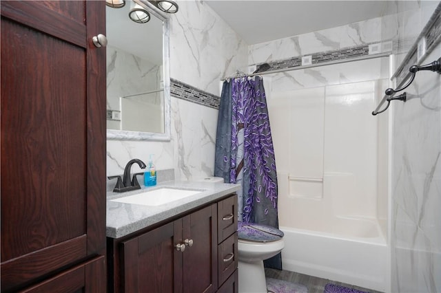 full bathroom featuring shower / tub combo with curtain, vanity, hardwood / wood-style flooring, and toilet