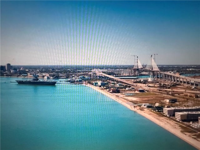 aerial view featuring a beach view and a water view