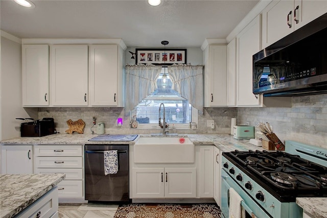 kitchen featuring decorative backsplash, sink, white cabinets, and appliances with stainless steel finishes