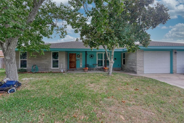 ranch-style home featuring a garage and a front yard