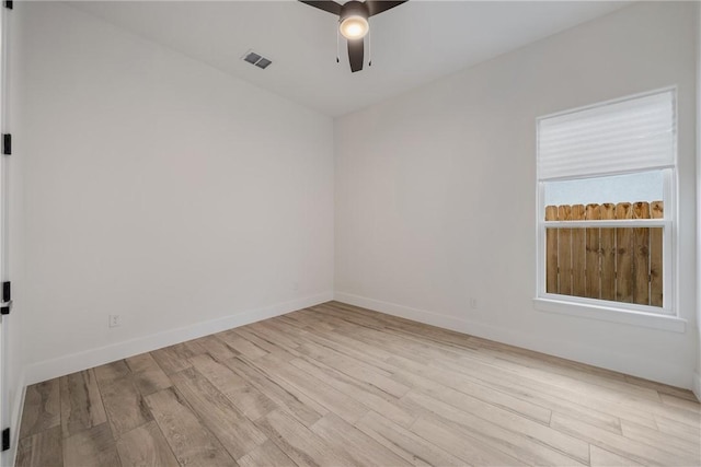 unfurnished room featuring ceiling fan and light hardwood / wood-style flooring