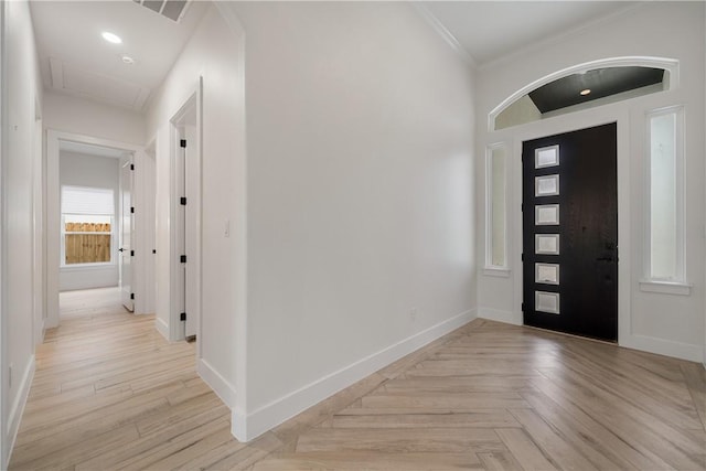 foyer entrance with ornamental molding