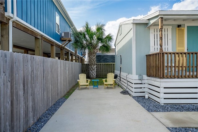 view of patio / terrace with cooling unit and fence private yard