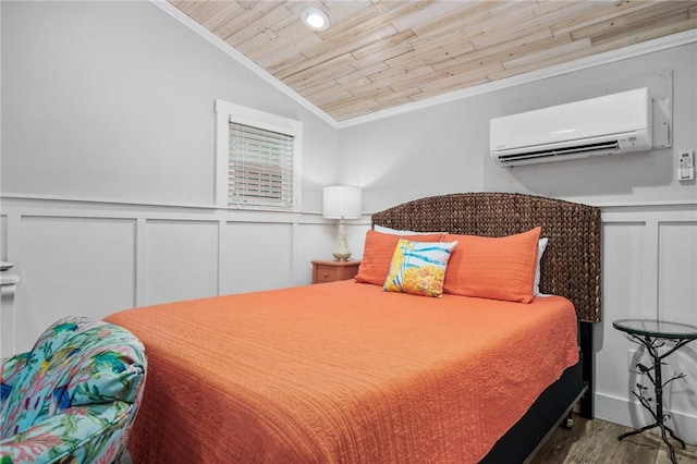 bedroom featuring lofted ceiling, wooden ceiling, wood finished floors, an AC wall unit, and crown molding