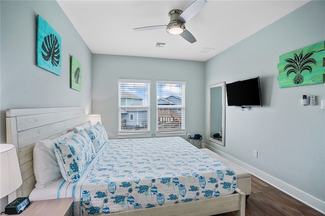 bedroom with hardwood / wood-style flooring and ceiling fan