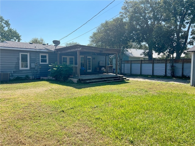 view of yard featuring a wooden deck