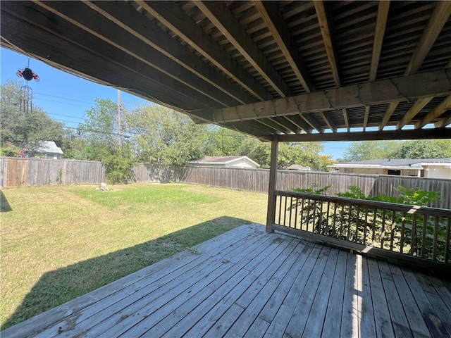 wooden terrace with a yard