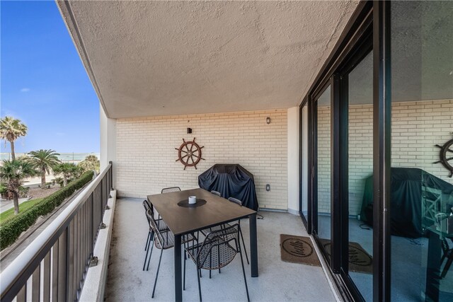 balcony featuring area for grilling