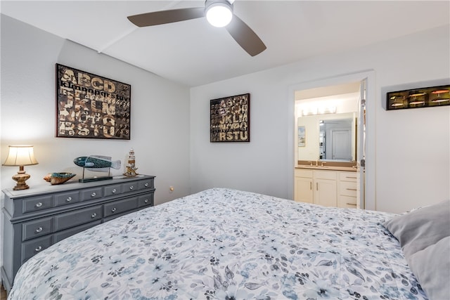 bedroom featuring sink, ceiling fan, and ensuite bathroom