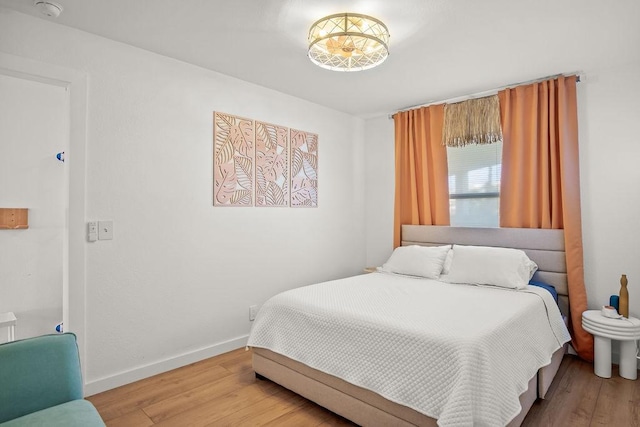 bedroom featuring hardwood / wood-style flooring