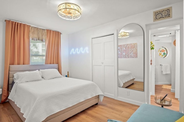 bedroom featuring wood-type flooring