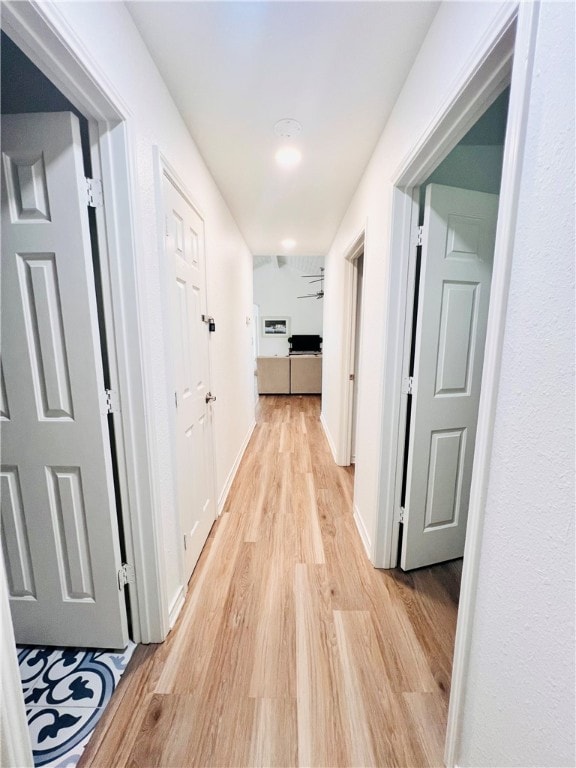 hallway featuring light hardwood / wood-style floors