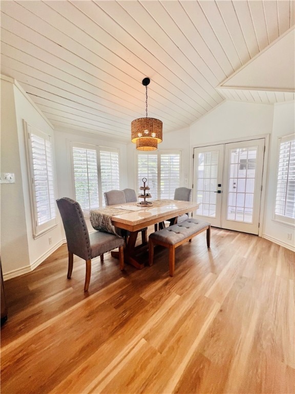 dining space with hardwood / wood-style floors and plenty of natural light