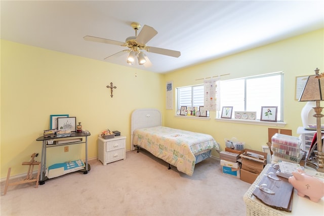 bedroom featuring ceiling fan and carpet flooring