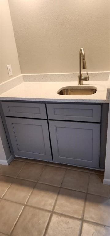 bathroom featuring tile patterned floors and vanity