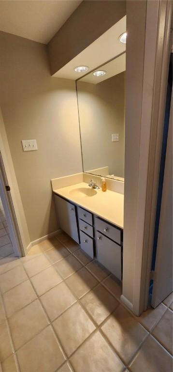 bathroom featuring tile patterned floors and vanity