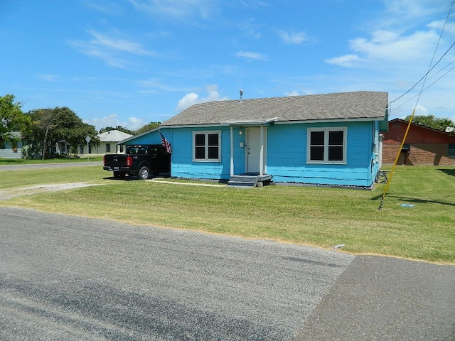 view of front of home with a front yard