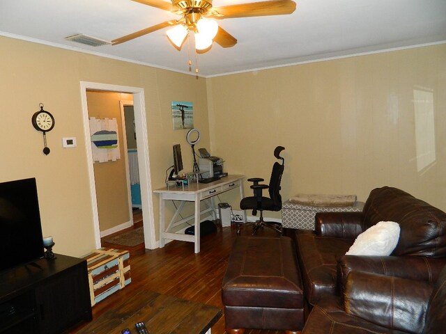 office space featuring dark wood-type flooring, ceiling fan, and ornamental molding