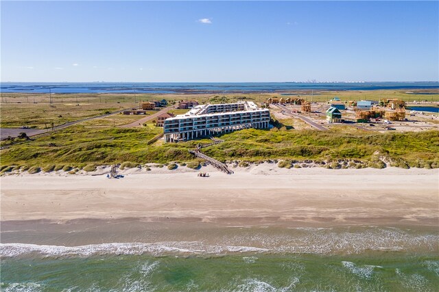 aerial view featuring a beach view and a water view