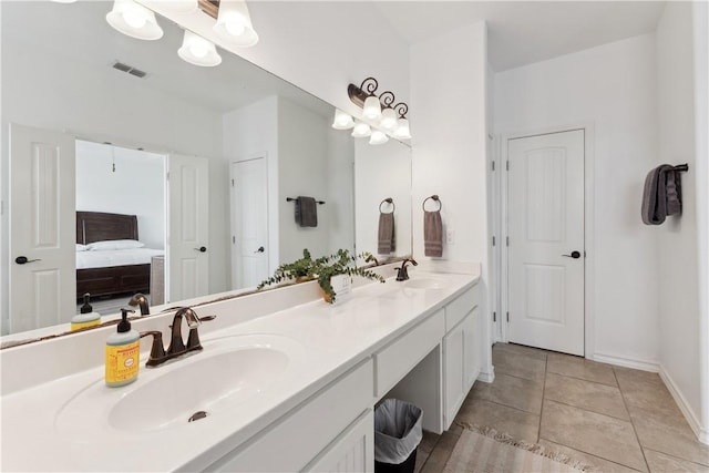 14334 Cruiser St Unit 101, Corpus Christi, TX 78418 - full bath featuring double vanity and tile patterned floors