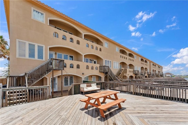 14334 Cruiser St Unit 101, Corpus Christi, TX 78418 - wooden deck with stairs