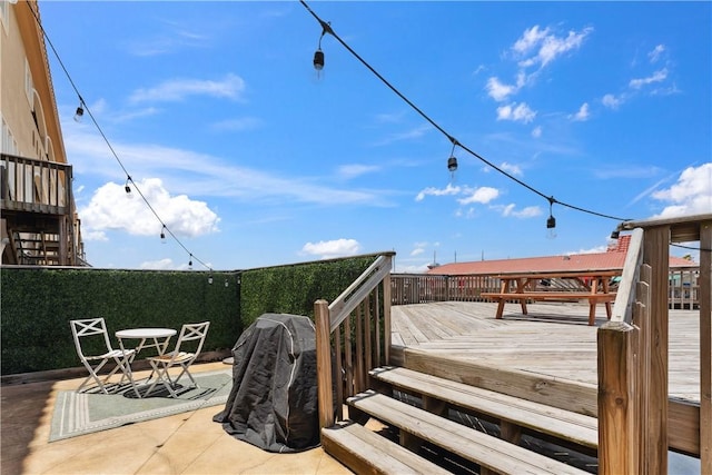14334 Cruiser St Unit 101, Corpus Christi, TX 78418 - wooden deck featuring a patio
