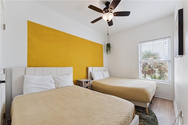 14334 Cruiser St Unit 101, Corpus Christi, TX 78418 - bedroom with wood finished floors and ceiling fan