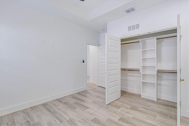 unfurnished bedroom featuring a closet