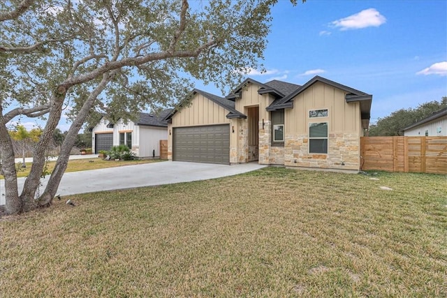 view of front facade with a garage and a front yard