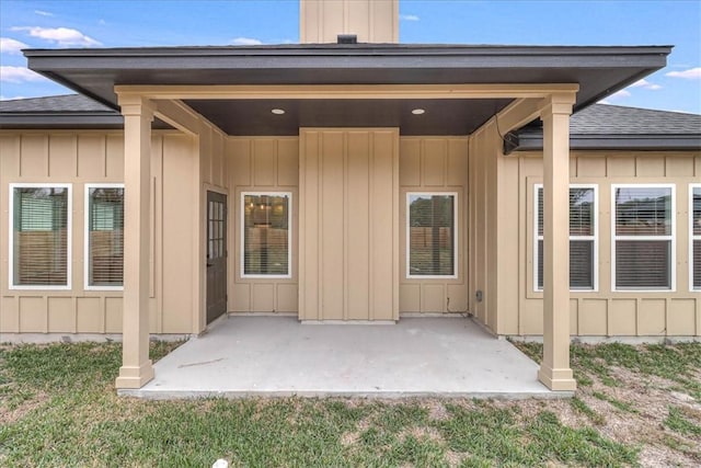 entrance to property with a patio