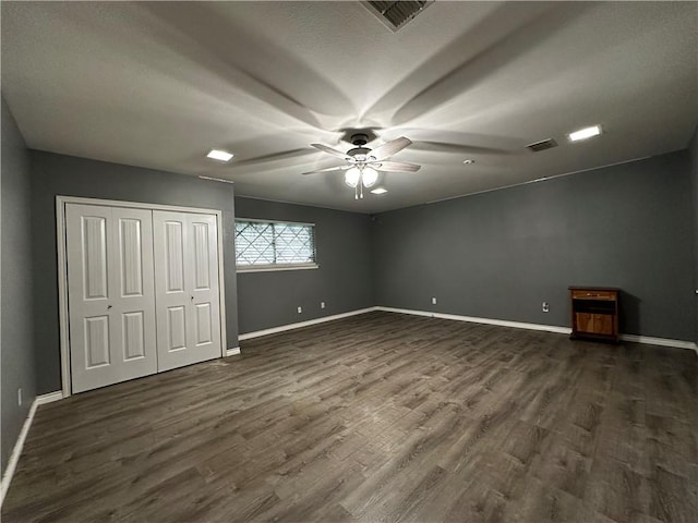 3321 Casa Bonita Dr, Corpus Christi, TX 78411 - unfurnished bedroom with baseboards, dark wood-style floors, and visible vents