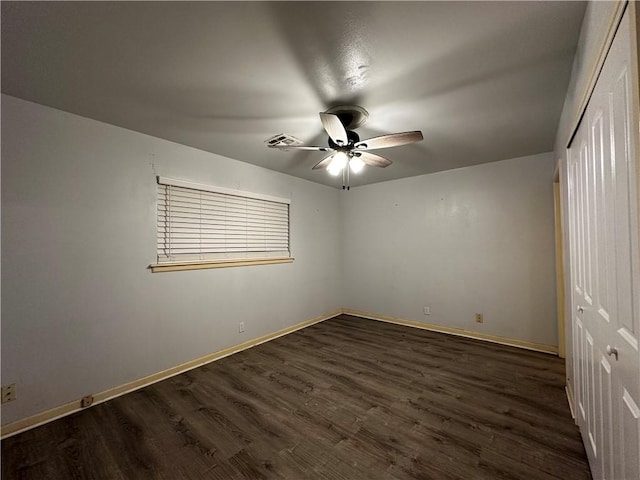 3321 Casa Bonita Dr, Corpus Christi, TX 78411 - unfurnished bedroom with baseboards, a closet, and dark wood finished floors