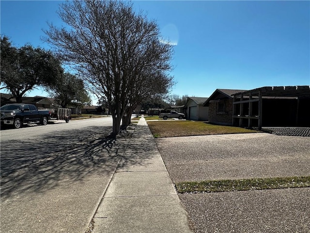 view of yard featuring a residential view