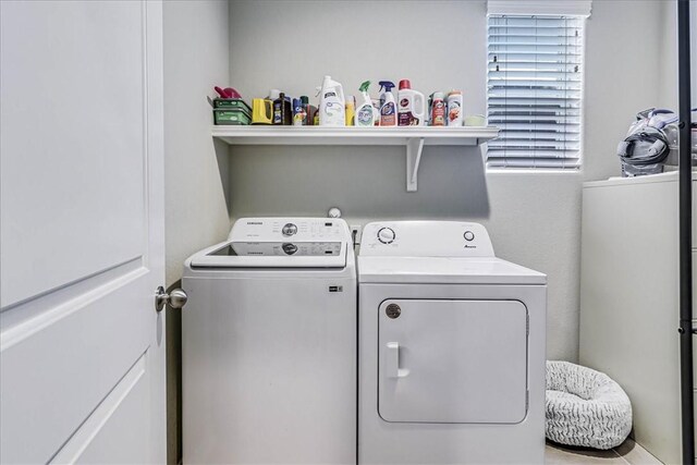 laundry room with washer and dryer