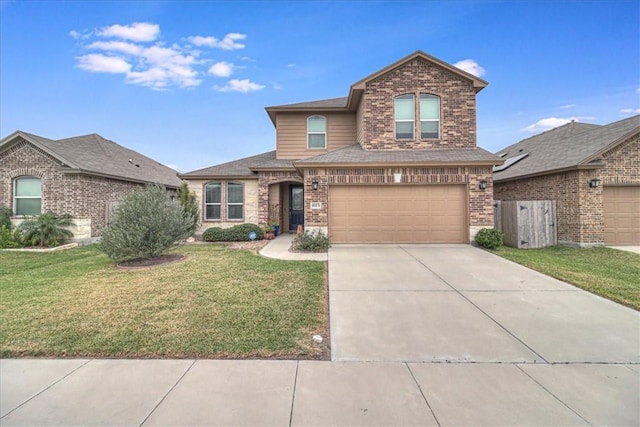 front facade with a front yard and a garage