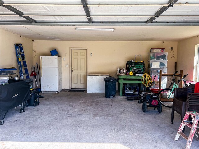 garage with white refrigerator