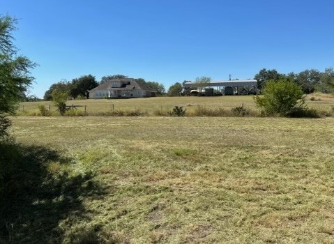 view of yard featuring a rural view